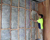 Acoustic  insulation R2.5 Soundscreen being installed