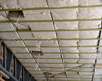 Bulk insulation installed over battens.
