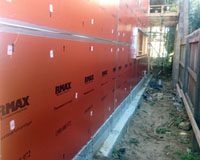 RMax ThermaAdvantage board being installed as thermally superior sisalation wrap.