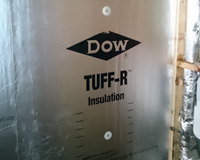 Dow Tuff-R 25.4mm thermal insulation boards installed directly to block walls with Hilti fasteners.